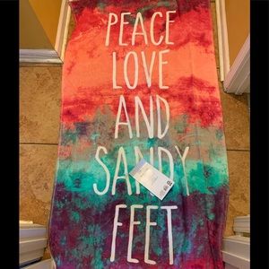 Large beach towel says peace love and Sandy feet